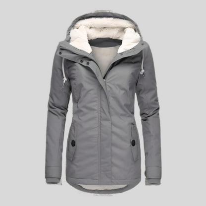 Quietly Waterproof hooded jacket with long silhouette for women | Madelyn