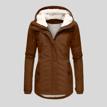 Quietly Waterproof hooded jacket with long silhouette for women | Madelyn