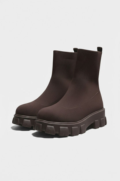 Motivating Thick-soled ankle boots with round-toe silhouette for women | Caurelle