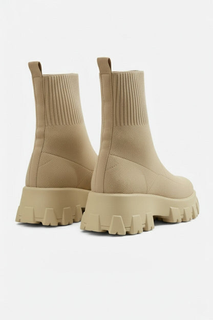 Motivating Thick-soled ankle boots with round-toe silhouette for women | Caurelle