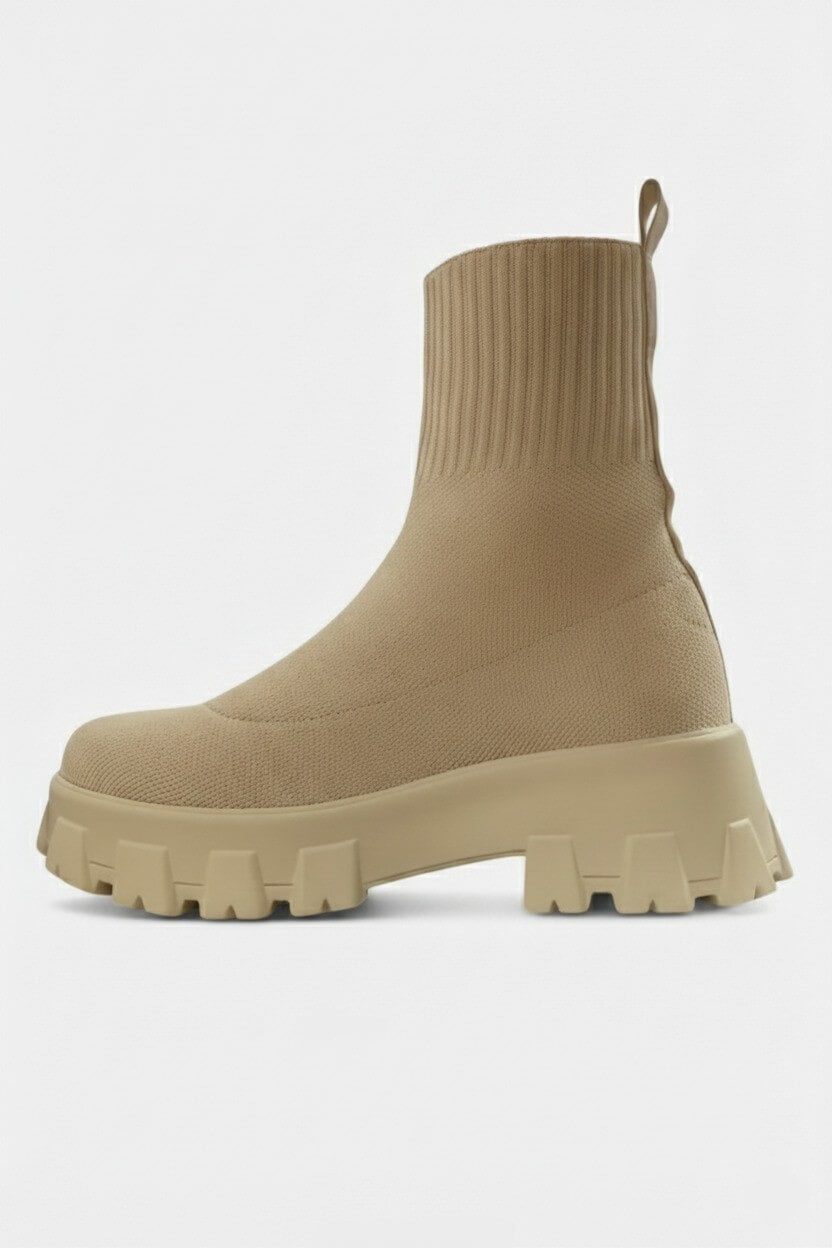 Motivating Thick-soled ankle boots with round-toe silhouette for women | Caurelle